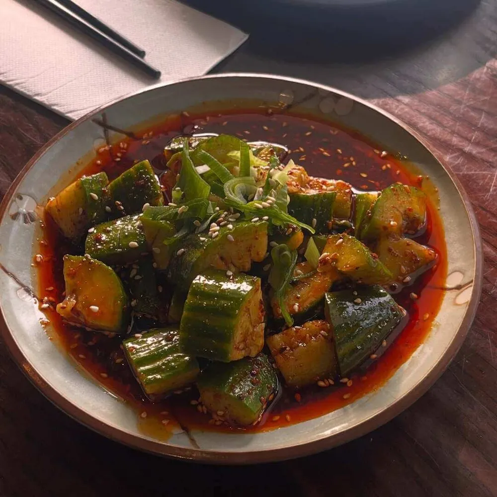 Close up of cucumber in red sauce at Miss Peppercorn