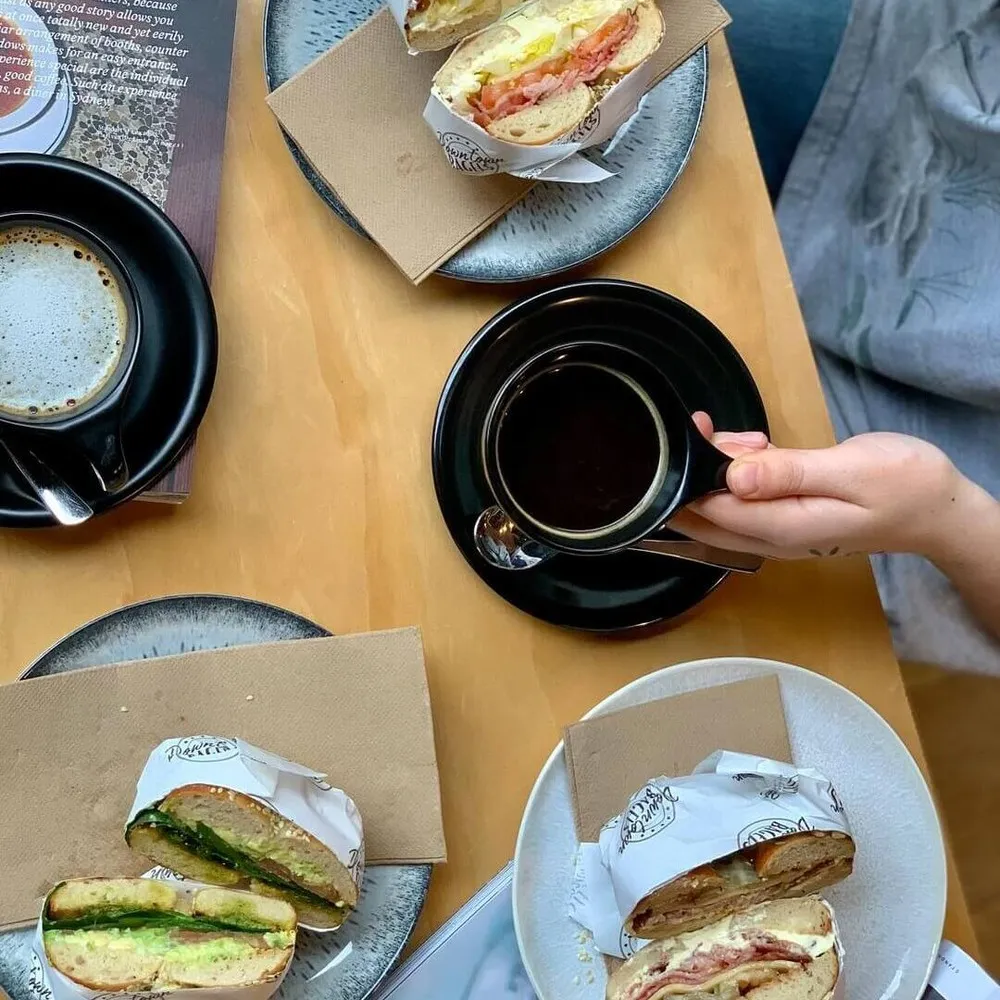 Overhead shot of coffee and bagels at Fika