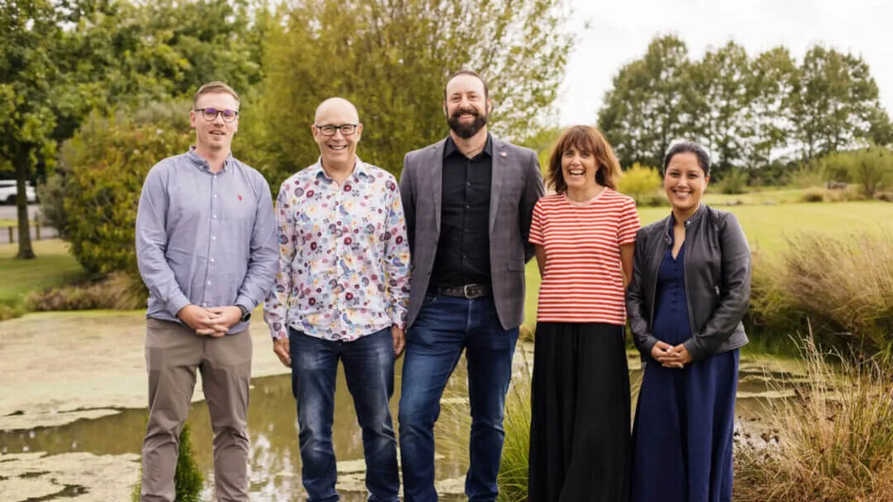 Mainland Angels team of five standing outside