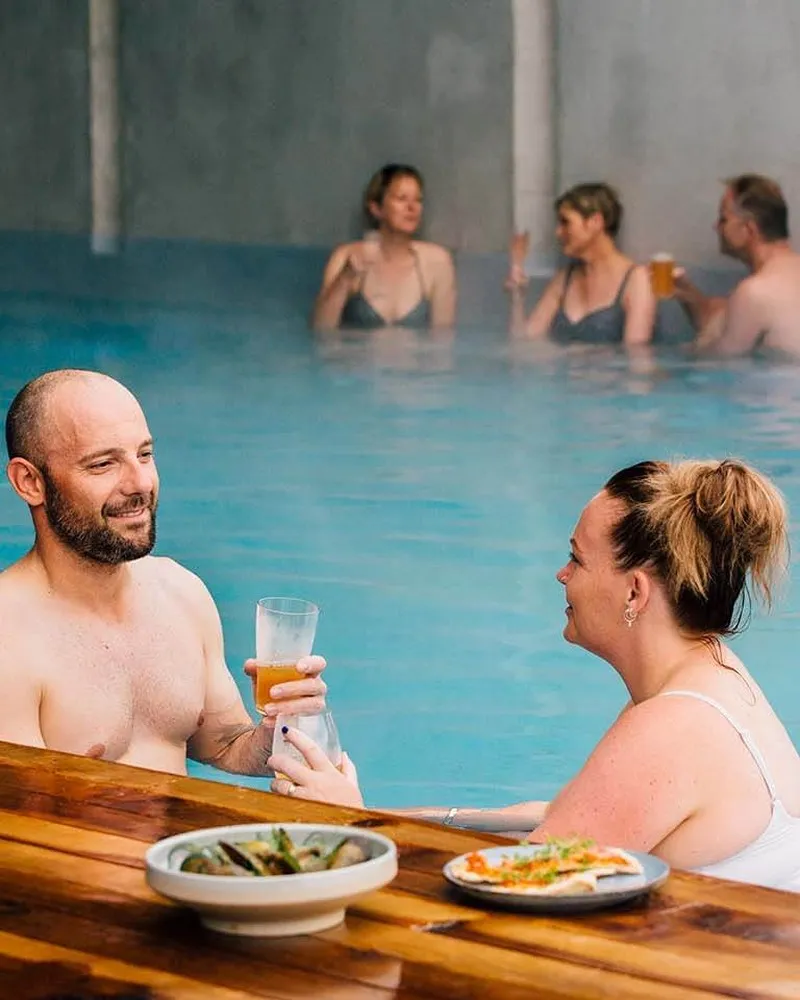 People enjoying the Opuke hot pools in Methven