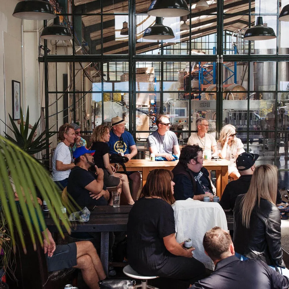 Patrons inside Three Boys Brewery