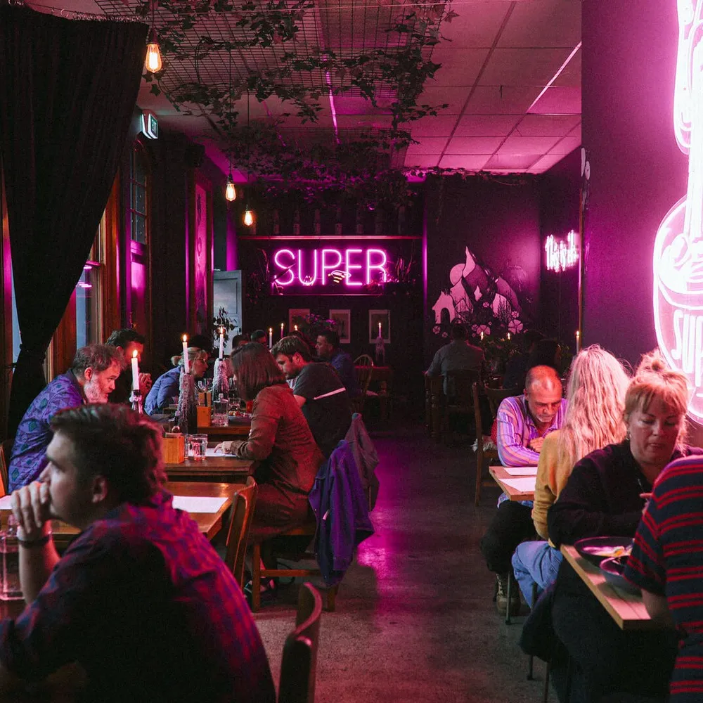 Super interior, patrons sitting at tables