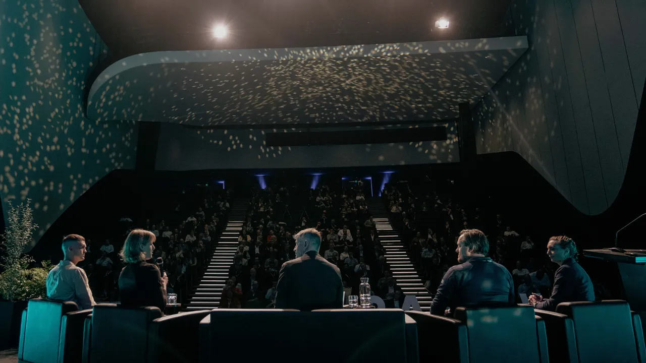 People in lecture theatre at Aerospace presentation.