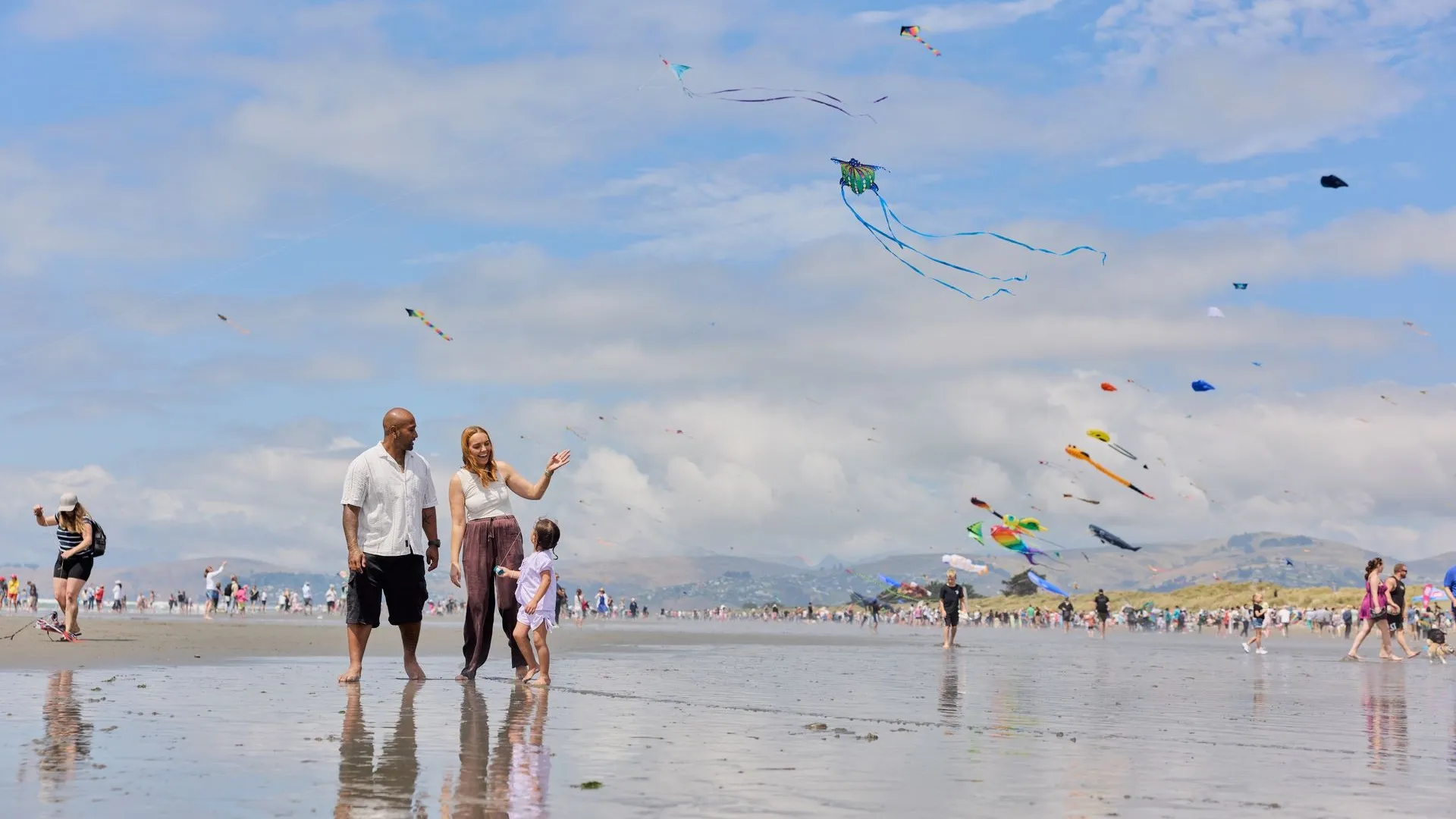 family enjoying the kites in New Brighton
