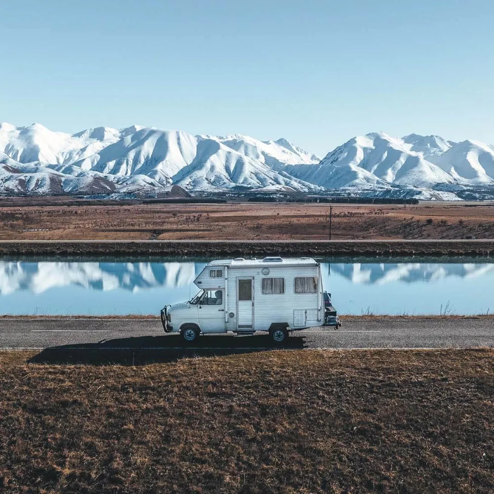 Campervan in front of the Twizel canals
