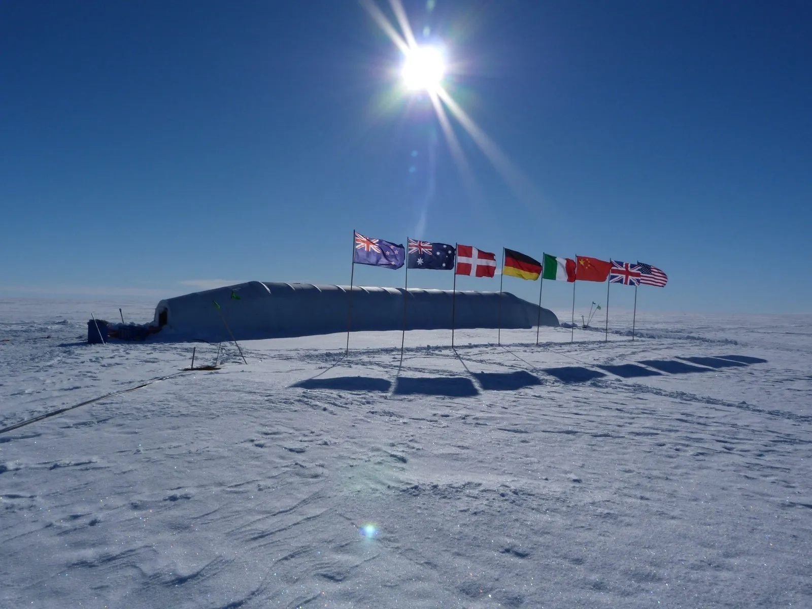 Antarctic Flags On The Ice