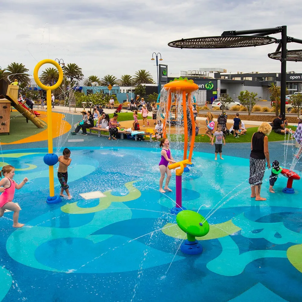 Children playing on splash pad at New Brighton playground