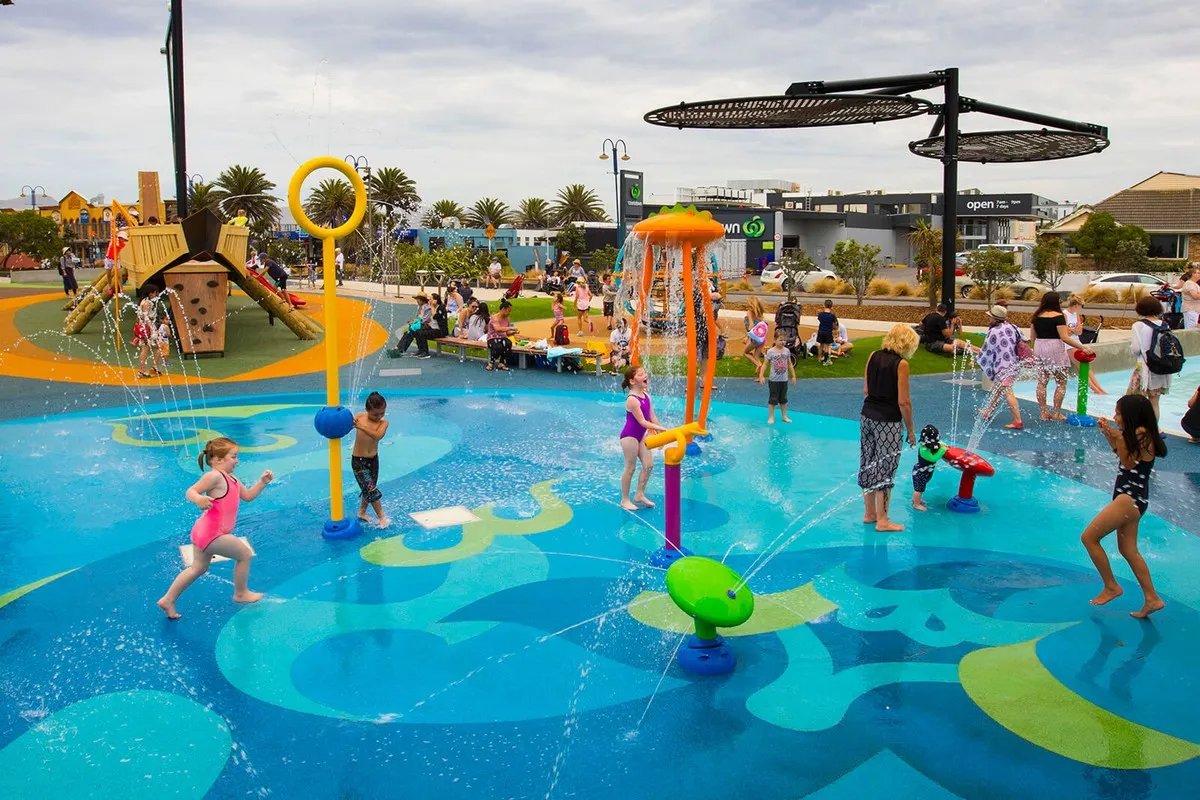 Children playing on splash pad at New Brighton playground