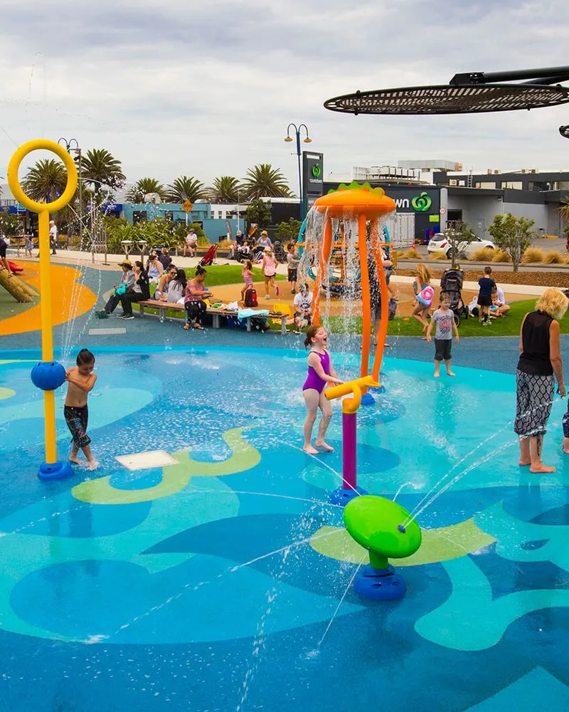 Children playing on splash pad at New Brighton playground