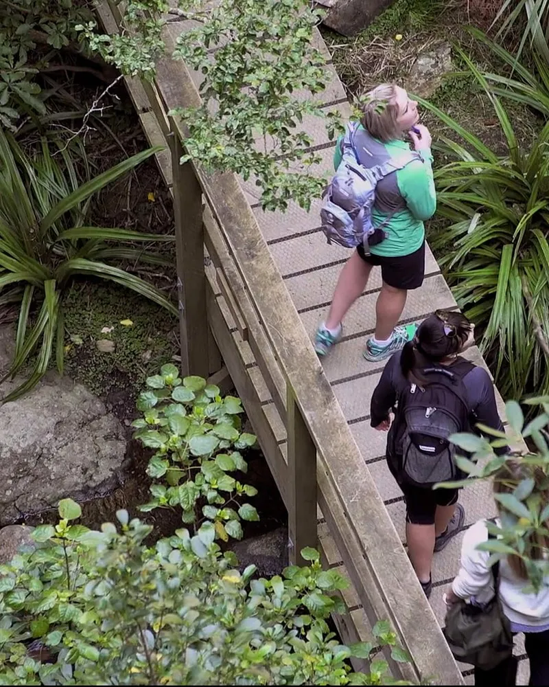 Three ladies walking at Washpen Falls
