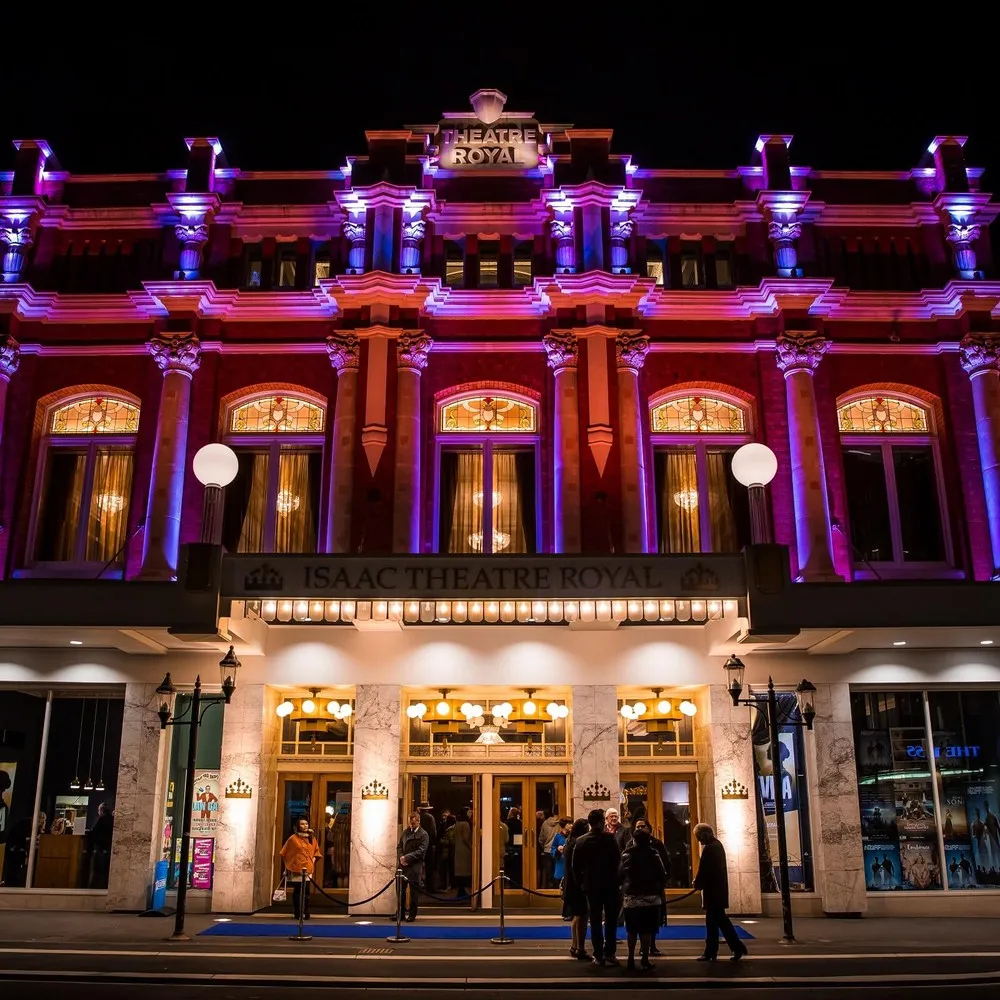 Bright lights on the exterior of the Isaac Theatre Royal