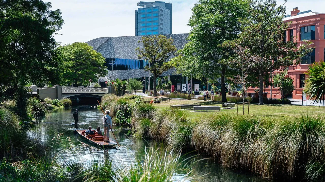 Punting on the Avon in front of Te Pae Convention Centre.