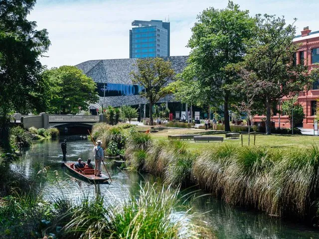 Punting on the Avon in front of Te Pae Convention Centre.