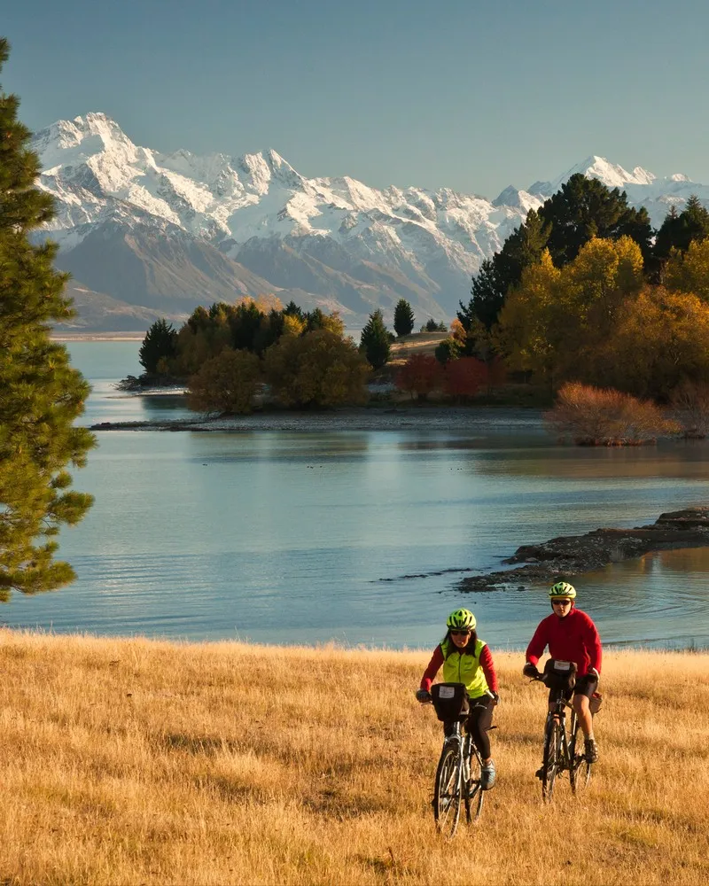 Three people biking on the Ocean to Alps cycle track