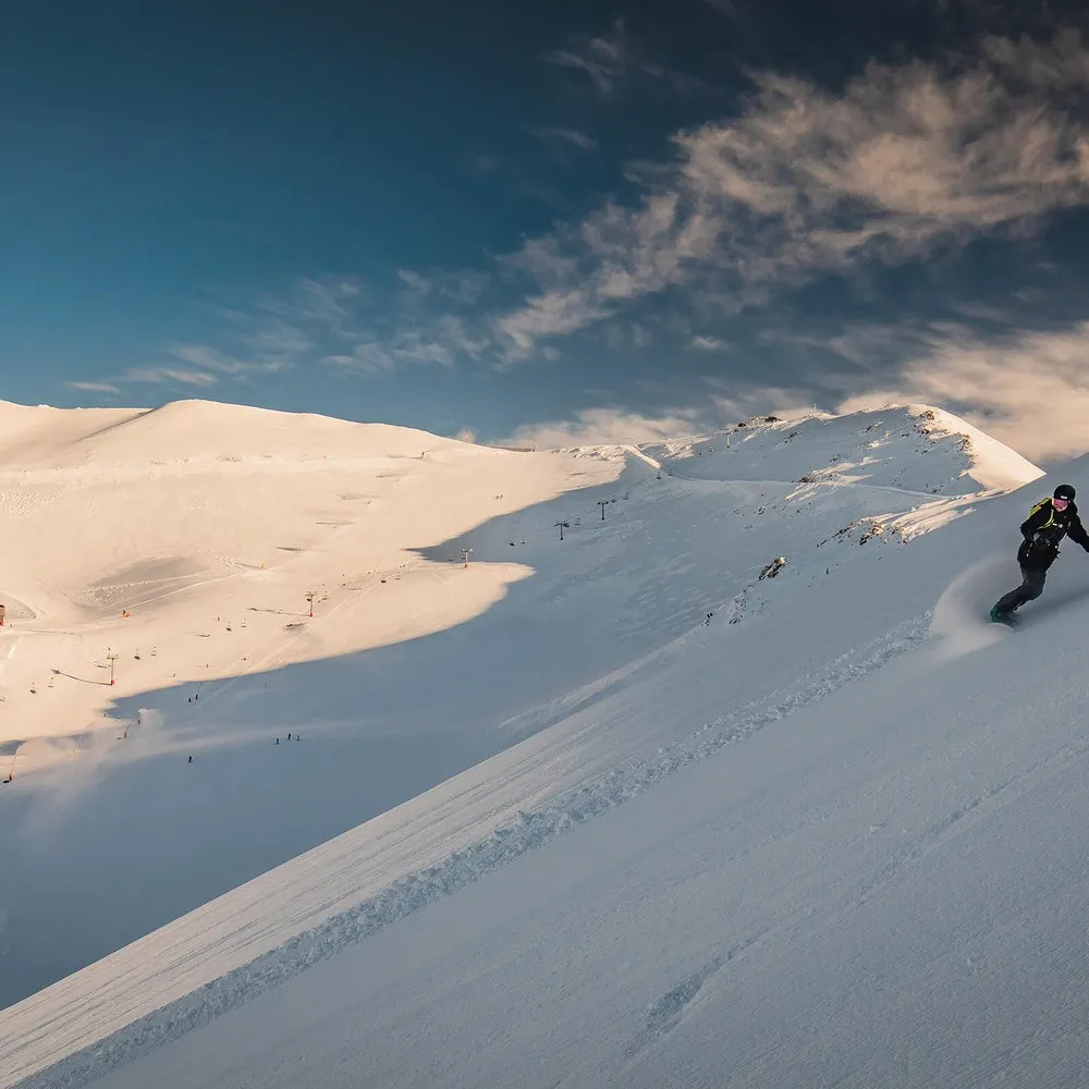 Snowboarders at Mt Hutt in pristine snow
