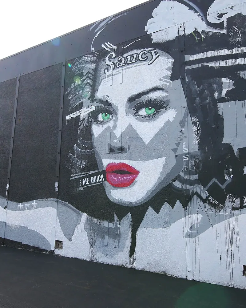 Christchurch street art mural of a woman
