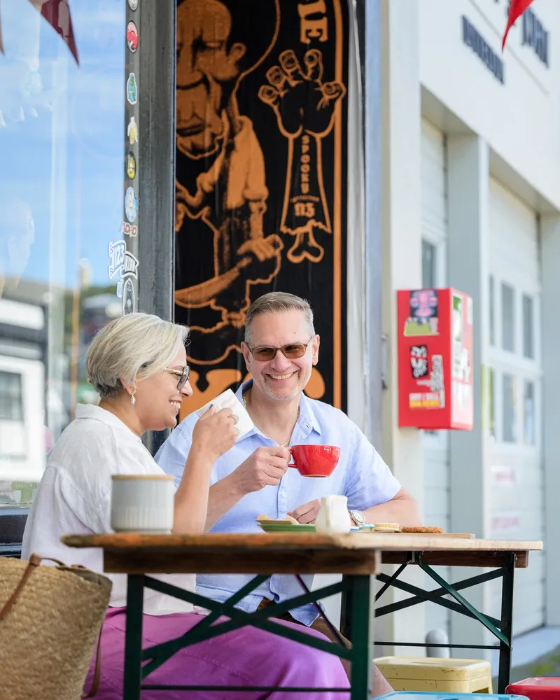 A couple enjoying coffee in Lyttelton.