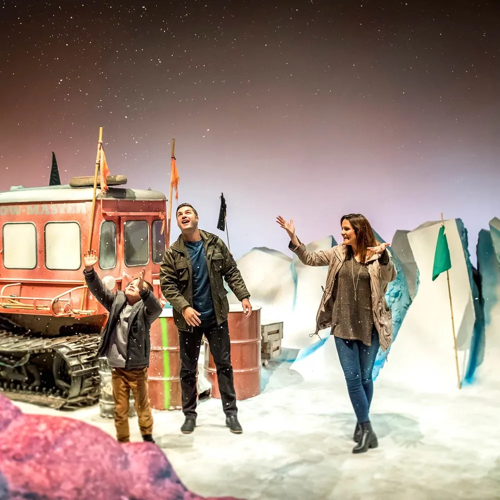 Family enjoying their time in the Antarctic Centre