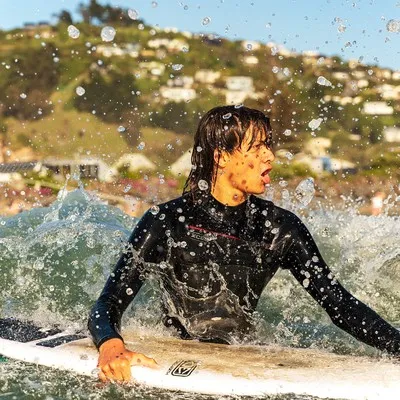 Surfer at Sumner Beach.