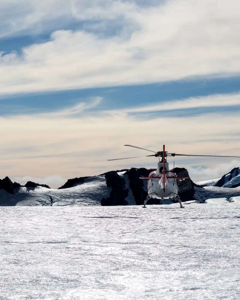 Mario Karner helicopter on glacier