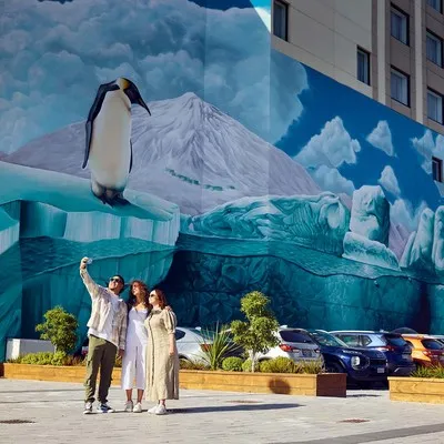 Taking a selfie in front of the Antarctic Mural