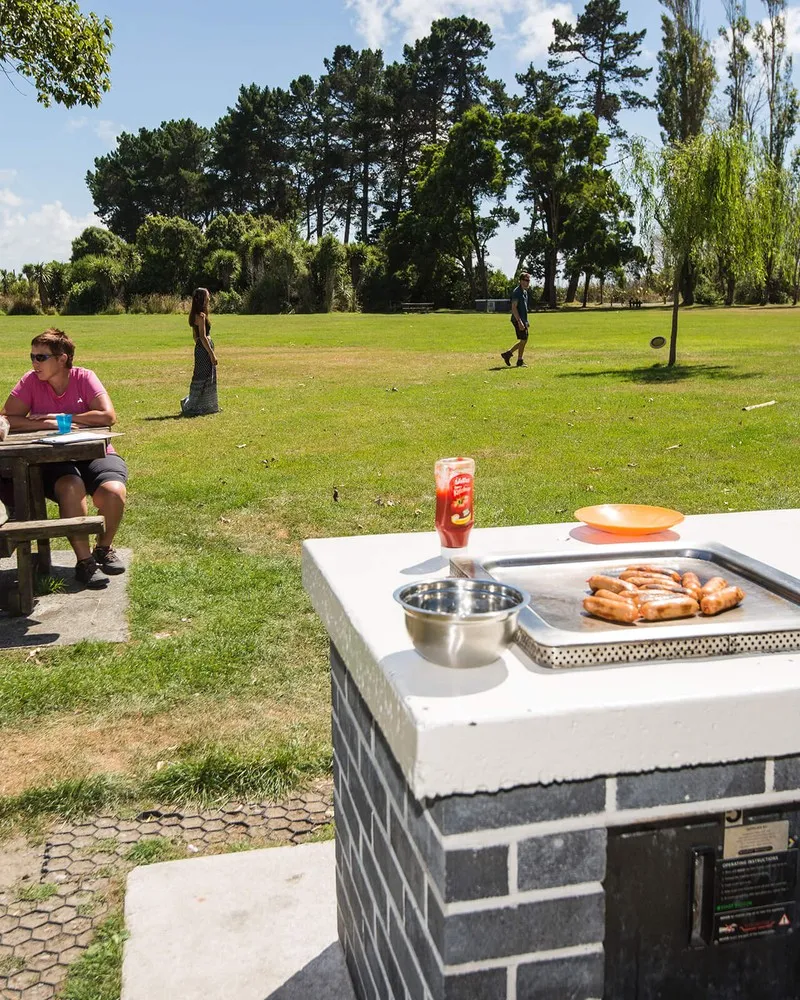 People enjoying an outdoor BBQ at Spencerville