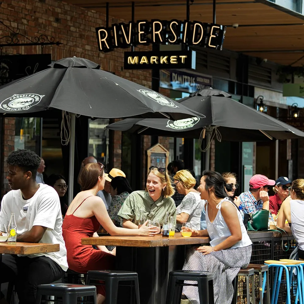 Friends enjoyng their time at Riverside Market.