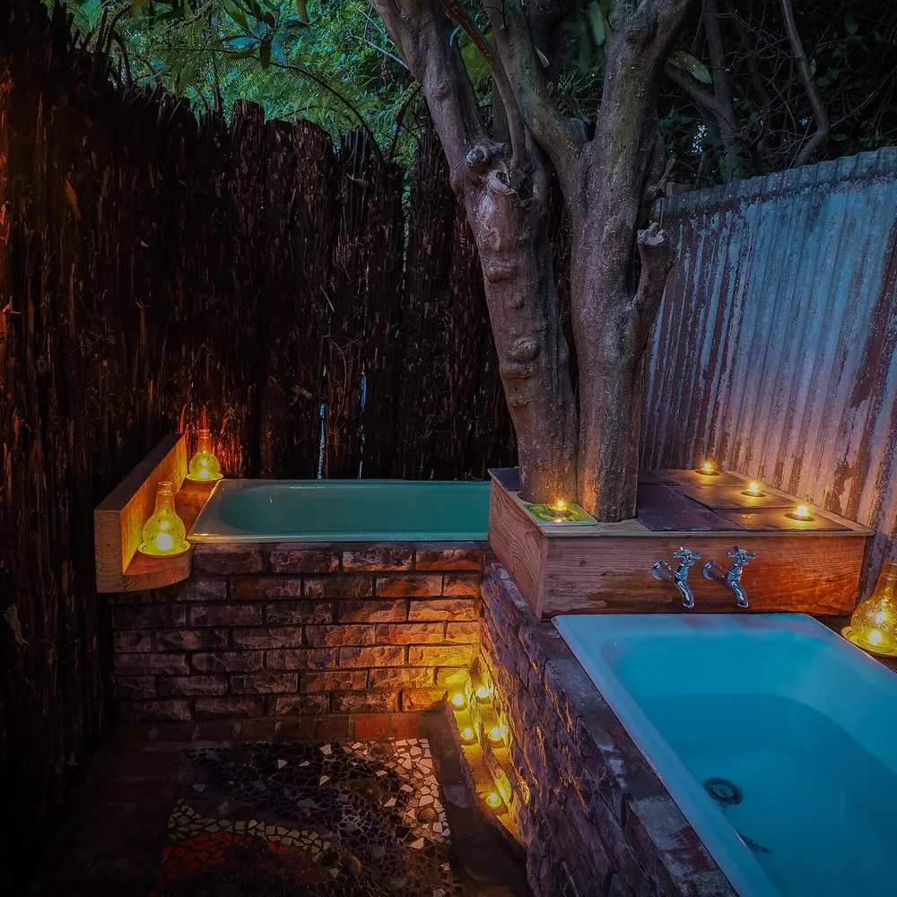 Eco Lodge outside bath at night time