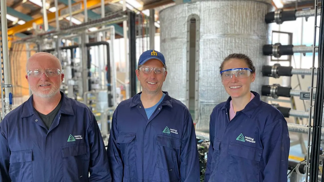 Mark Chris and Megan In Front Of Pilot Plant