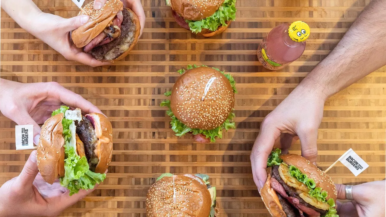 A collection of burgers on a table