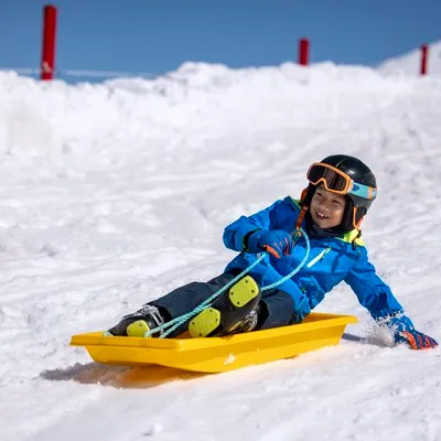 Child tobogganing