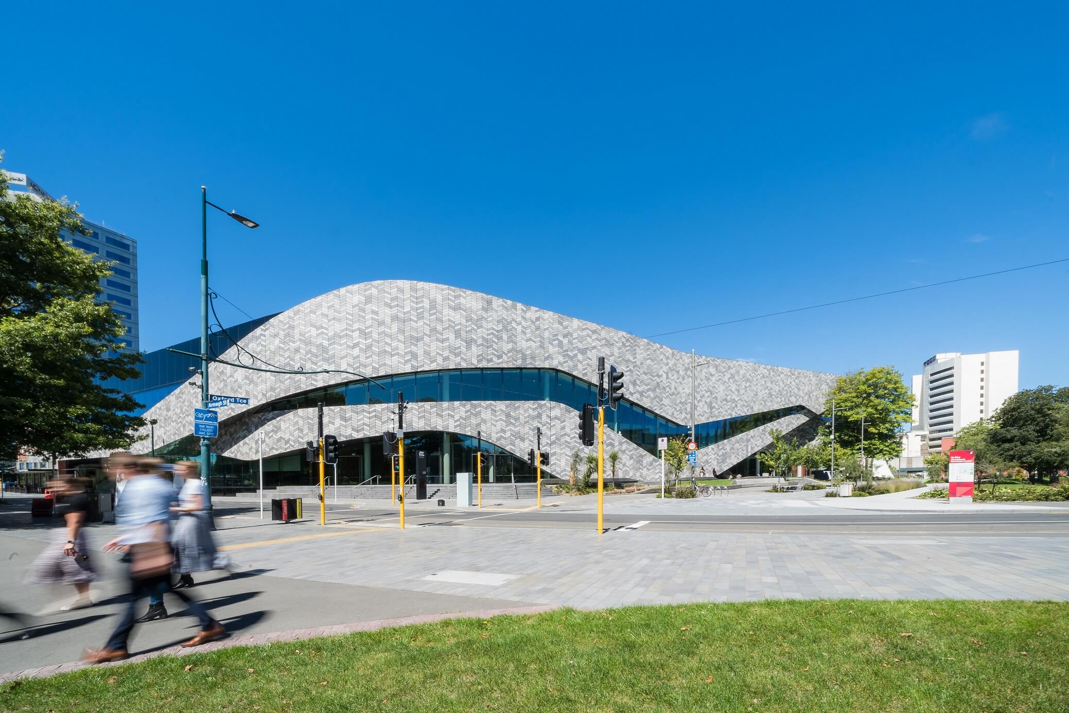 Delegates Walking Past Outside Of Te Pae