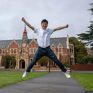 Quan Jumping In Front Of Library