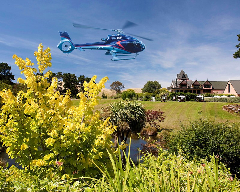 A Helicopter lands at Pegasus Bay winery