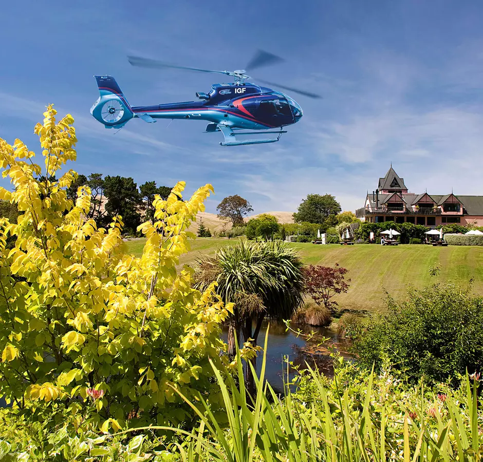 A Helicopter lands at Pegasus Bay winery