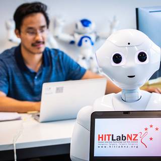 Hitt Lab Man With Robot
